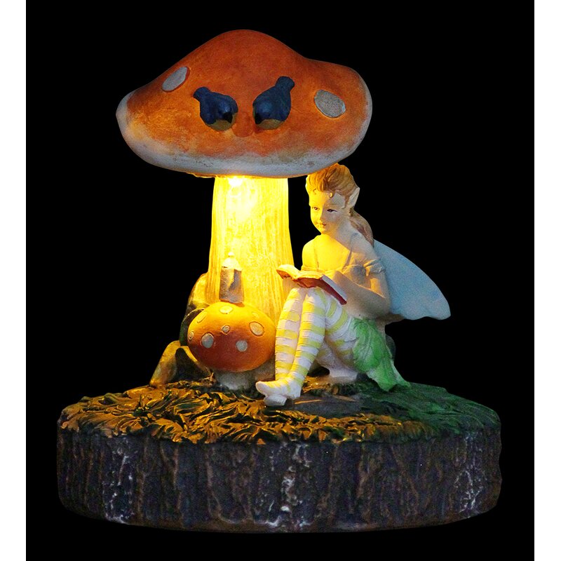 fairy on mushroom statue